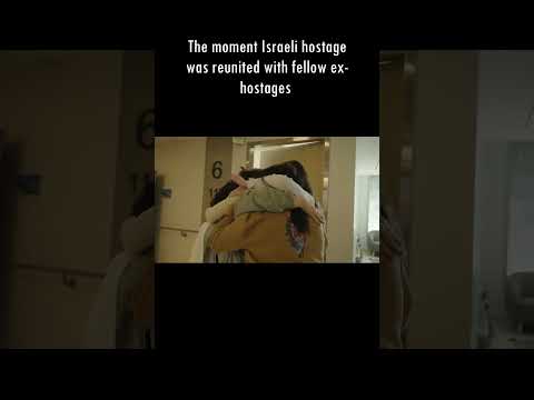 The moment Israeli hostage was reunited with fellow ex-hostages