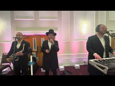 Motty Brier on the keys & Kalmy Schwartz @ Duvid Katz