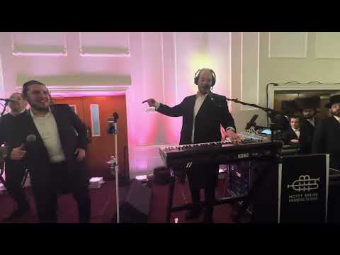 Motty Brier on the keys & KALMY SChWARTZ @ Duvid Katz Cleeco