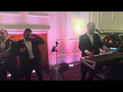 Motty Brier on the keys & & Kalmy Schwartz @ Duvid Kats Cleeco
