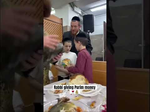 Rabbi giving Purim money🍷💰