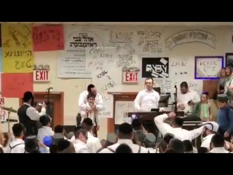 Lipa Schmeltzer Performing 'Mashka,' With His son Shimmy, In Camp Munkatch