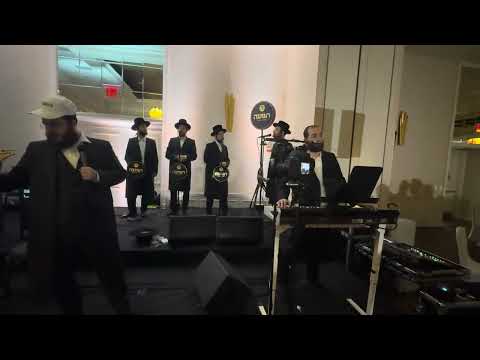 Shimy Levy on the keys & Yidi Bialostozky & Nussbaum & Krupp