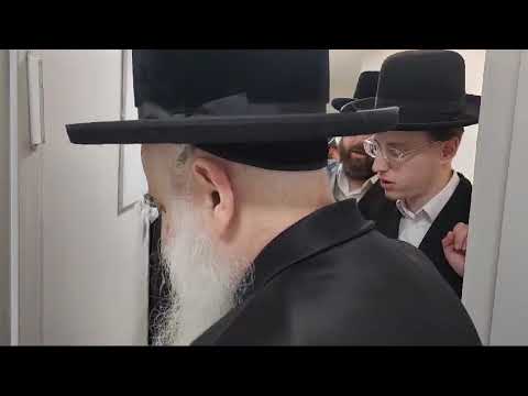 Botoshan Rebbe Putting Up A mezuzah at the house of one of his chassidim – Iyar 5785